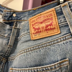 Levi’s 501 size 27-28 distressed mid rise jeans